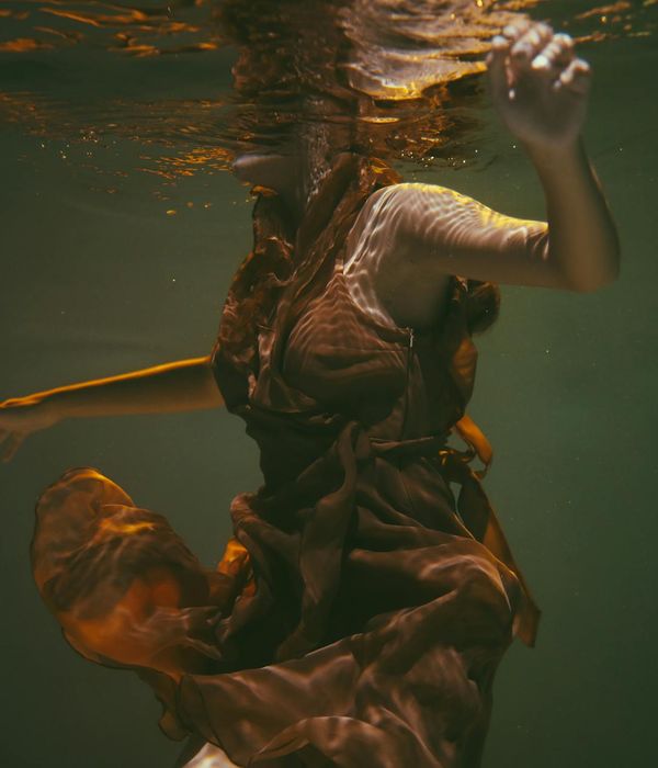 Woman in a graceful and calm pose, radiating harmony.